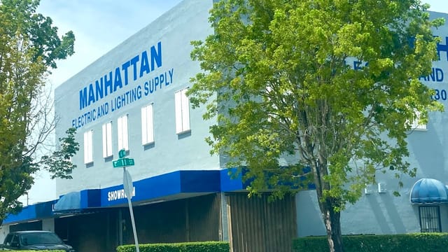Manhattan Electric and Lighting Supply logo
